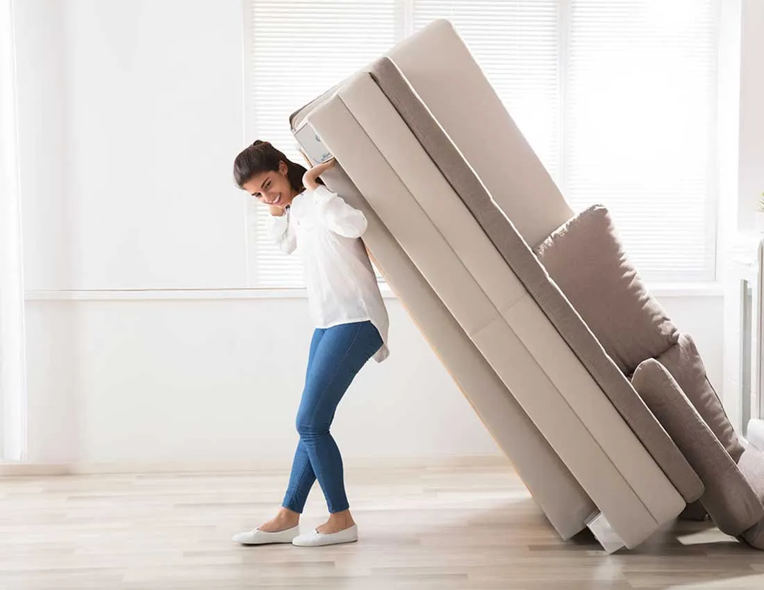 Lady moving sofa | Simple Flooring Solutions